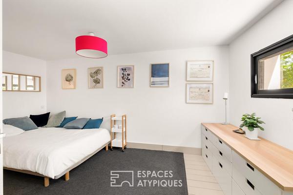 Maison contemporaine dans un écrin de verdure avec piscine