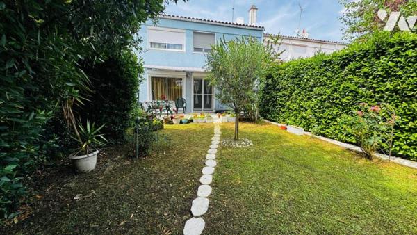 MAISON D'HABITATION EN TRES BON ETAT AVEC GARAGE ET TERRAIN PROCHE ECOLES, COMMERCES 