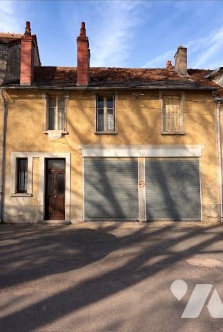 Un immeuble comprenant: