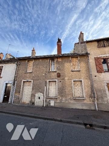 Un immeuble comprenant: