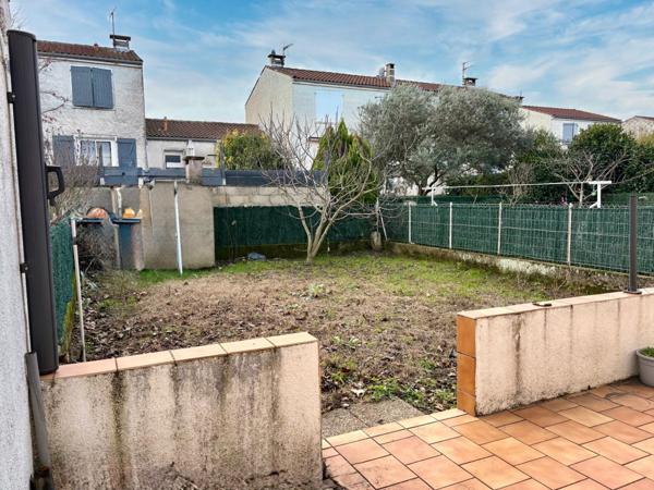 Maison rénovée avec garage et jardin