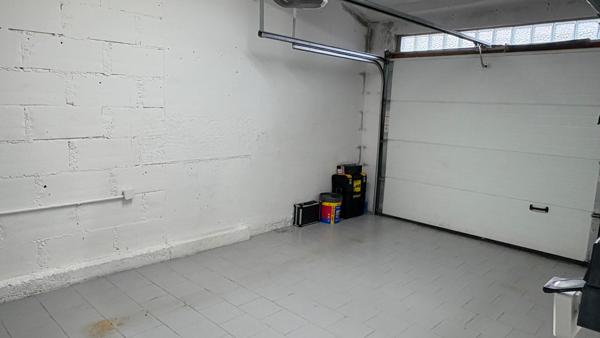 Maison rénovée avec garage et jardin