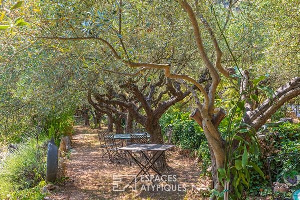 Propriété de deux maisons avec atelier et jardin d’artiste