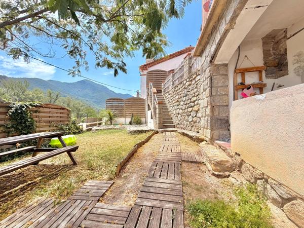 Maison 4 faces avec vue montagne et jardin