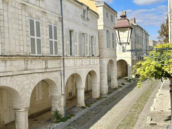 Appartement de caractère avec parking au coeur de Ville