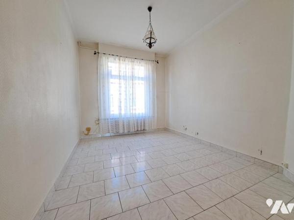 Douai maison mitoyenne comprenant: