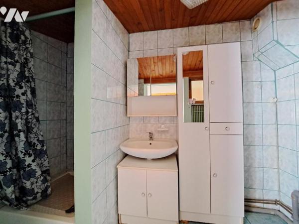 Douai maison mitoyenne comprenant: