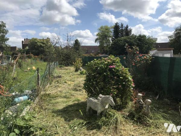 Douai maison mitoyenne comprenant: