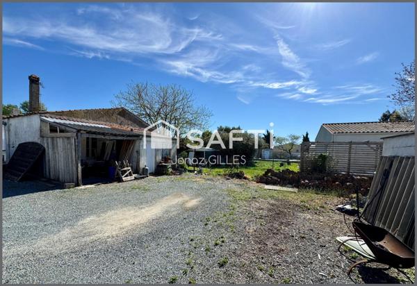 Terrain à bâtir avec bâtiment existant