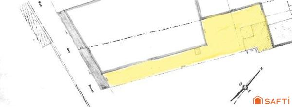 Terrain à bâtir avec bâtiment existant