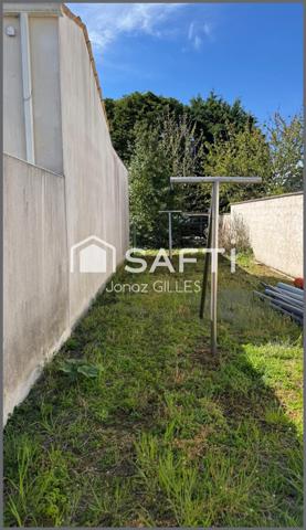 Terrain à bâtir avec bâtiment existant