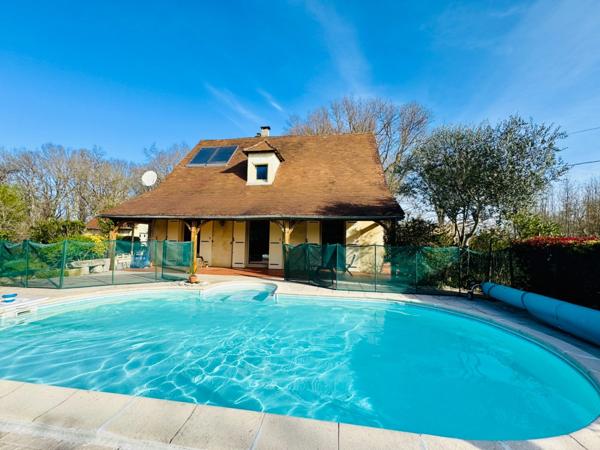 Maison familiale de 122 m2 avec piscine et garages sur 3 625 m² de terrain