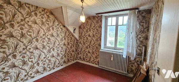 Lot de 2 logements avec dépendances et terrain