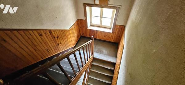 Lot de 2 logements avec dépendances et terrain