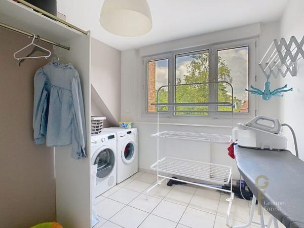 Maison mitoyenne 1 côté Marcq-en-Baroeul 190 m²