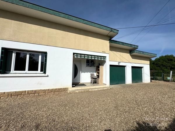 Maison de plain-pied 105 m² + double garage – env. 155 m² utiles – terrain 1 533 m² – proche commodités