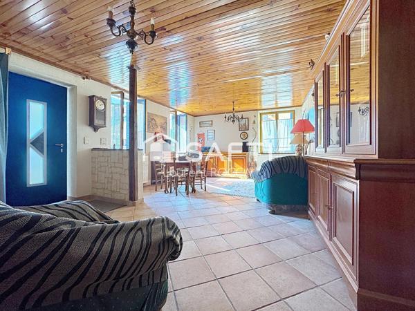 Maison familiale d’environ 110 m² – Beaux volumes, fort potentiel, jardin et garages