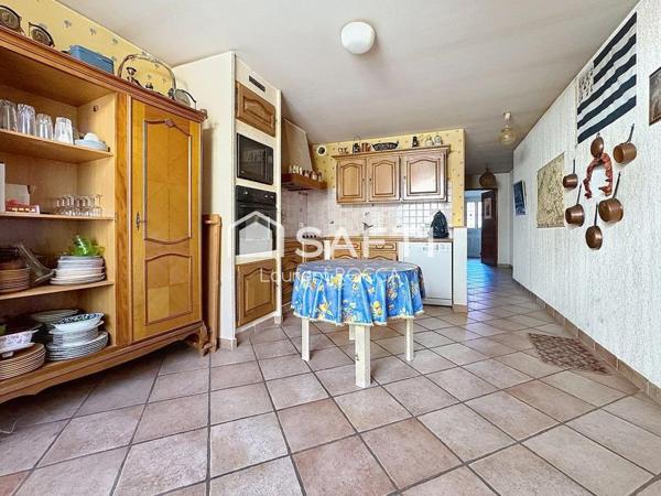 Maison familiale d’environ 110 m² – Beaux volumes, fort potentiel, jardin et garages