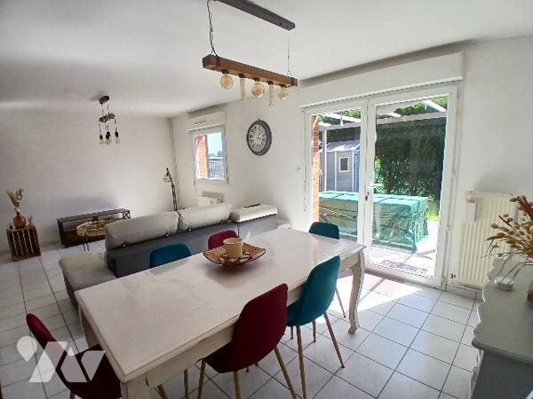 Maison semi individuelle 3 ch environ 80 m² avec jardin, garage et stationnement à SOMAIN