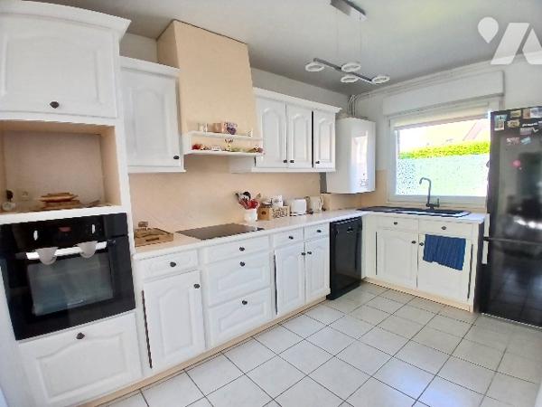 Maison semi individuelle 3 ch environ 80 m² avec jardin, garage et stationnement à SOMAIN