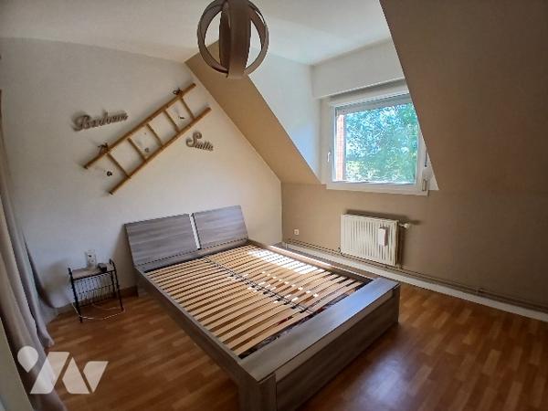 Maison semi individuelle 3 ch environ 80 m² avec jardin, garage et stationnement à SOMAIN