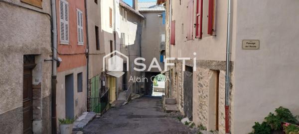Appartement de 86m² tranversant avec terrasse, local commercial, grenier