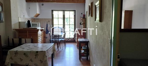 Appartement de 86m² tranversant avec terrasse, local commercial, grenier