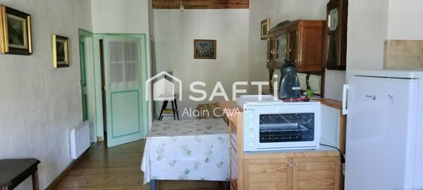 Appartement de 86m² tranversant avec terrasse, local commercial, grenier
