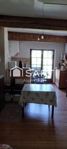 Appartement de 86m² tranversant avec terrasse, local commercial, grenier