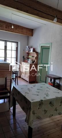 Appartement de 86m² tranversant avec terrasse, local commercial, grenier