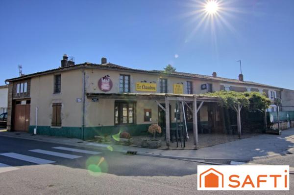 Immeuble pour investisseur ou projet commercial 290 m² comprenant 1 habitation et une surface commerciale.