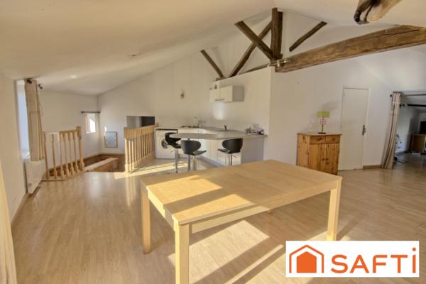 Immeuble pour investisseur ou projet commercial 290 m² comprenant 1 habitation et une surface commerciale.