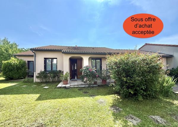 Maison plain-pied avec jardin, véranda, garage, 3 chambres