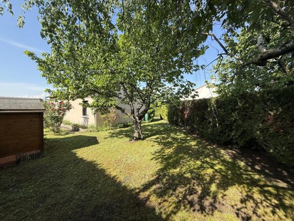 Maison plain-pied avec jardin, véranda, garage, 3 chambres