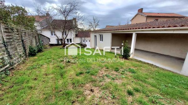 Maison de bourg 78m2, garage, préau et jardin
