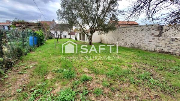 Maison de bourg 78m2, garage, préau et jardin