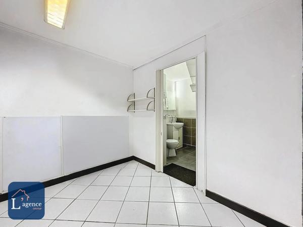 LOCAL COMMERCIAL - CENTRE-VILLE - GEX (01170)