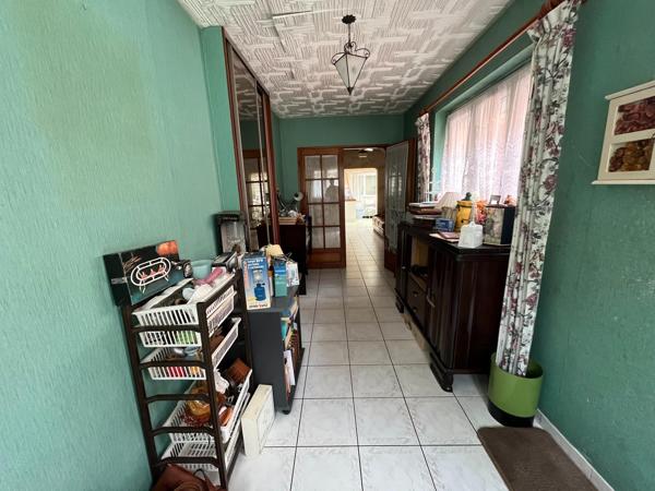 Maison semi individuelle avec jardin en fond d'impasse avec garage