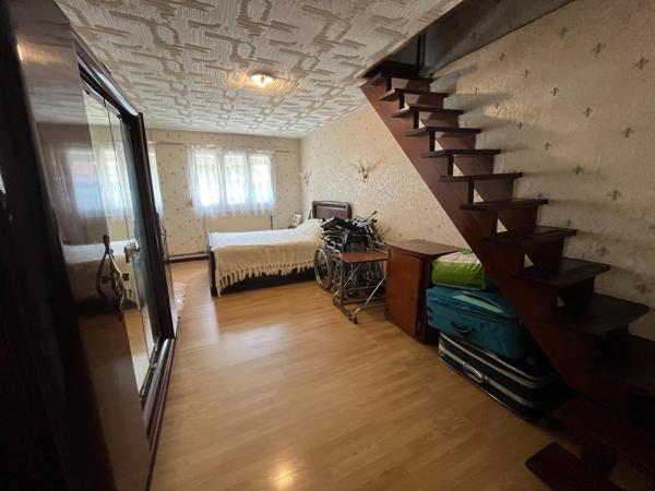 Maison semi individuelle avec jardin en fond d'impasse avec garage