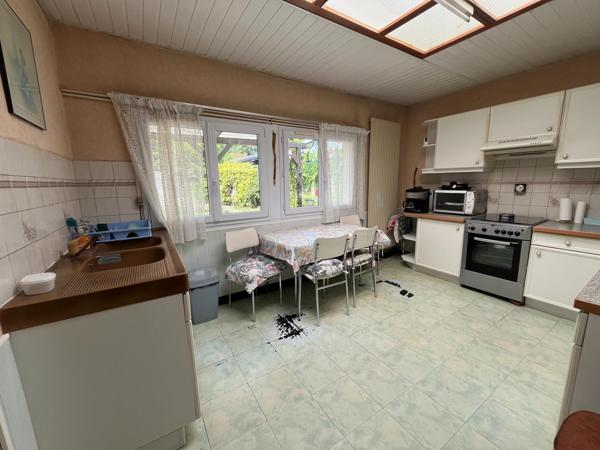 Maison semi individuelle avec jardin en fond d'impasse avec garage