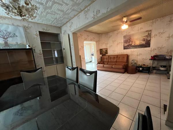 Maison semi individuelle avec jardin en fond d'impasse avec garage