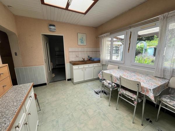 Maison semi individuelle avec jardin en fond d'impasse avec garage