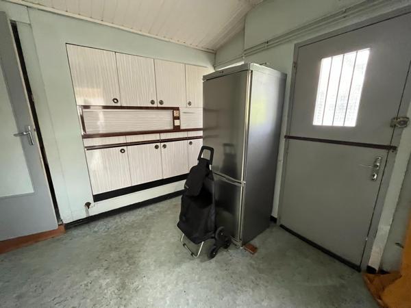 Maison semi individuelle avec jardin en fond d'impasse avec garage