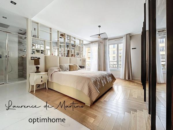 Appartement de 107 m2 rénovés avec suite parentale, terrasse, cave et parkings - Champs-Philippe -