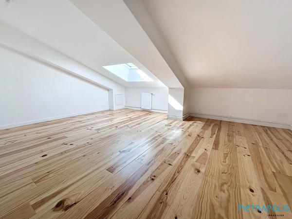 BEL APPARTEMENT T3 AVEC DE BEAUX VOLUMES DANS UNE COPROPRIETE AVEC ASCENSEUR