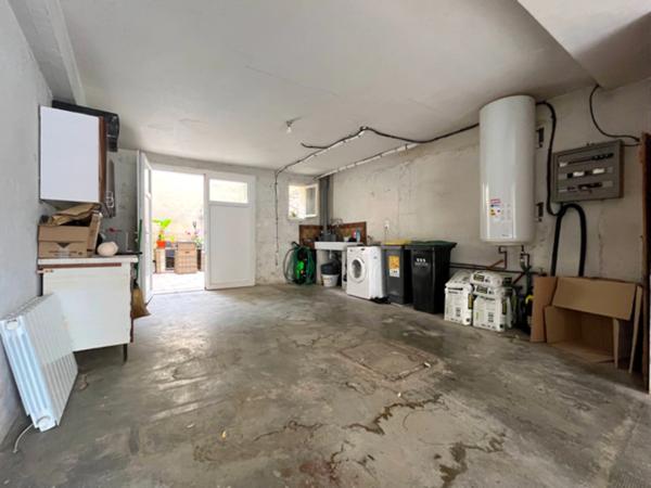 Dpt Hautes Pyrénées (65), à vendre TRIE SUR BAISE Maison T3 de 76 m² habitables avec garage et cour sur 78 m² de terrain, au centre ville