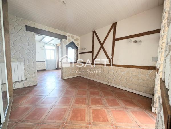 MAISON SEMI-MITOYENNE AVEC JARDIN