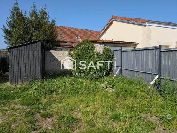 MAISON SEMI-MITOYENNE AVEC JARDIN