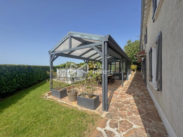 Longère 182 m2 avec double garage, terrain paysager, SPA, sauna...