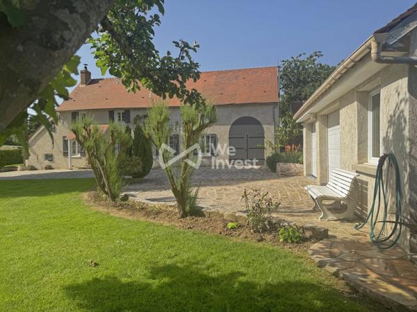 Longère 182 m2 avec double garage, terrain paysager, SPA, sauna...